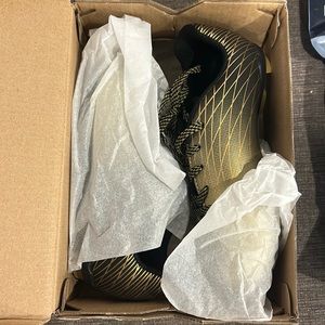 DSG gold/black soccer cleats with shin guards size 13k never worn